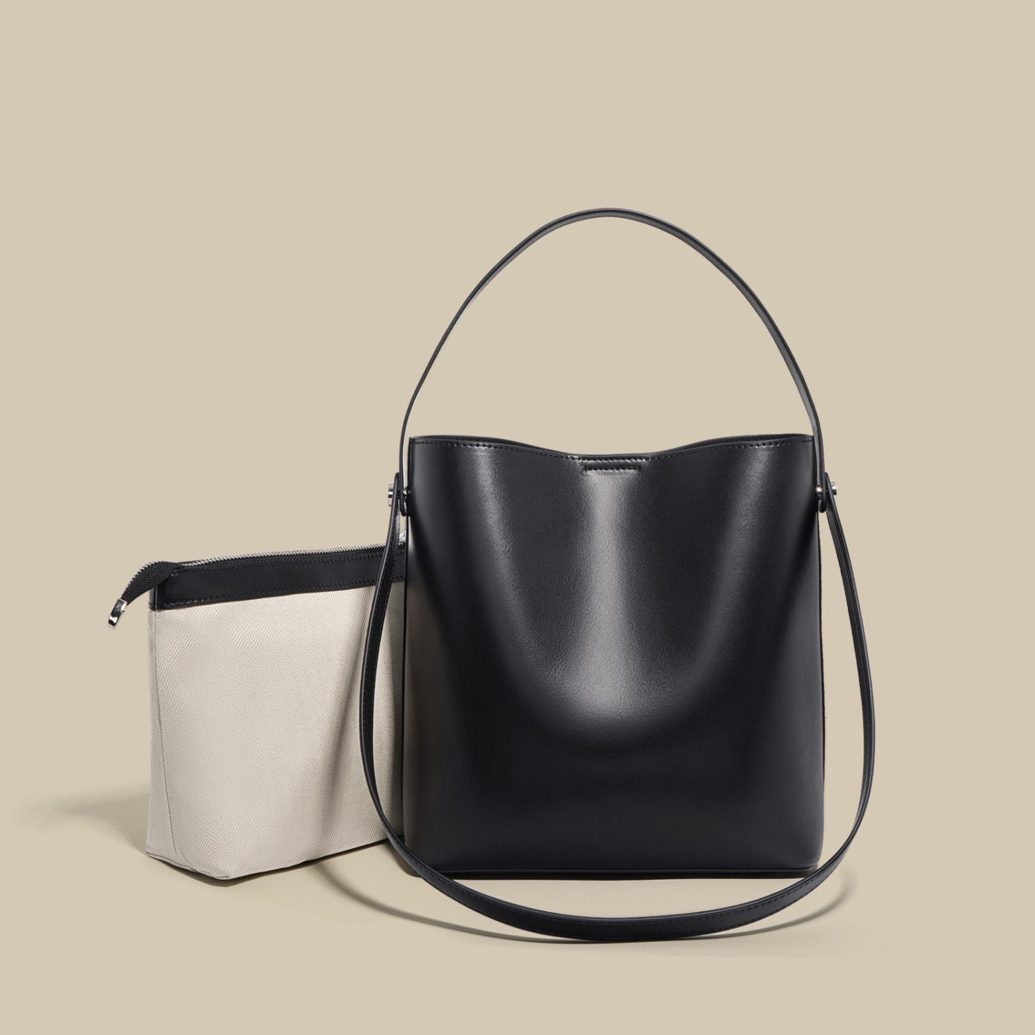 Black bucket shoulder bag sample for custom handbag manufacturing review